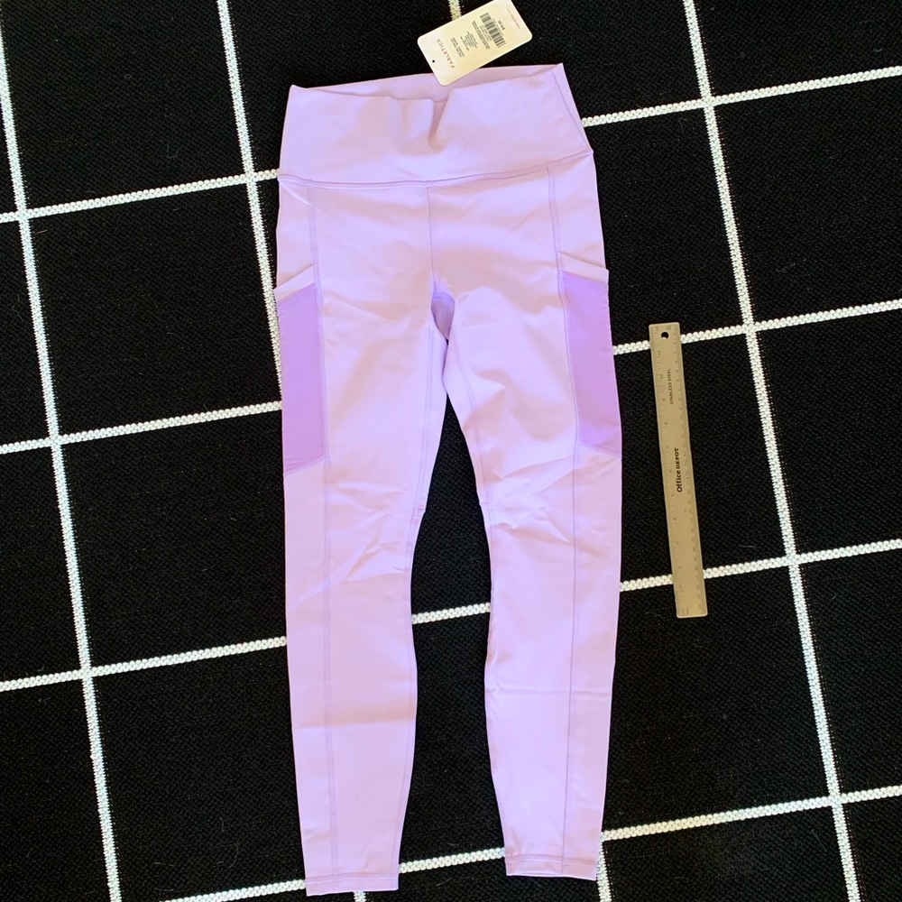 Brand new with tags Fabletics The On-the-go Legging Short in purple lavender